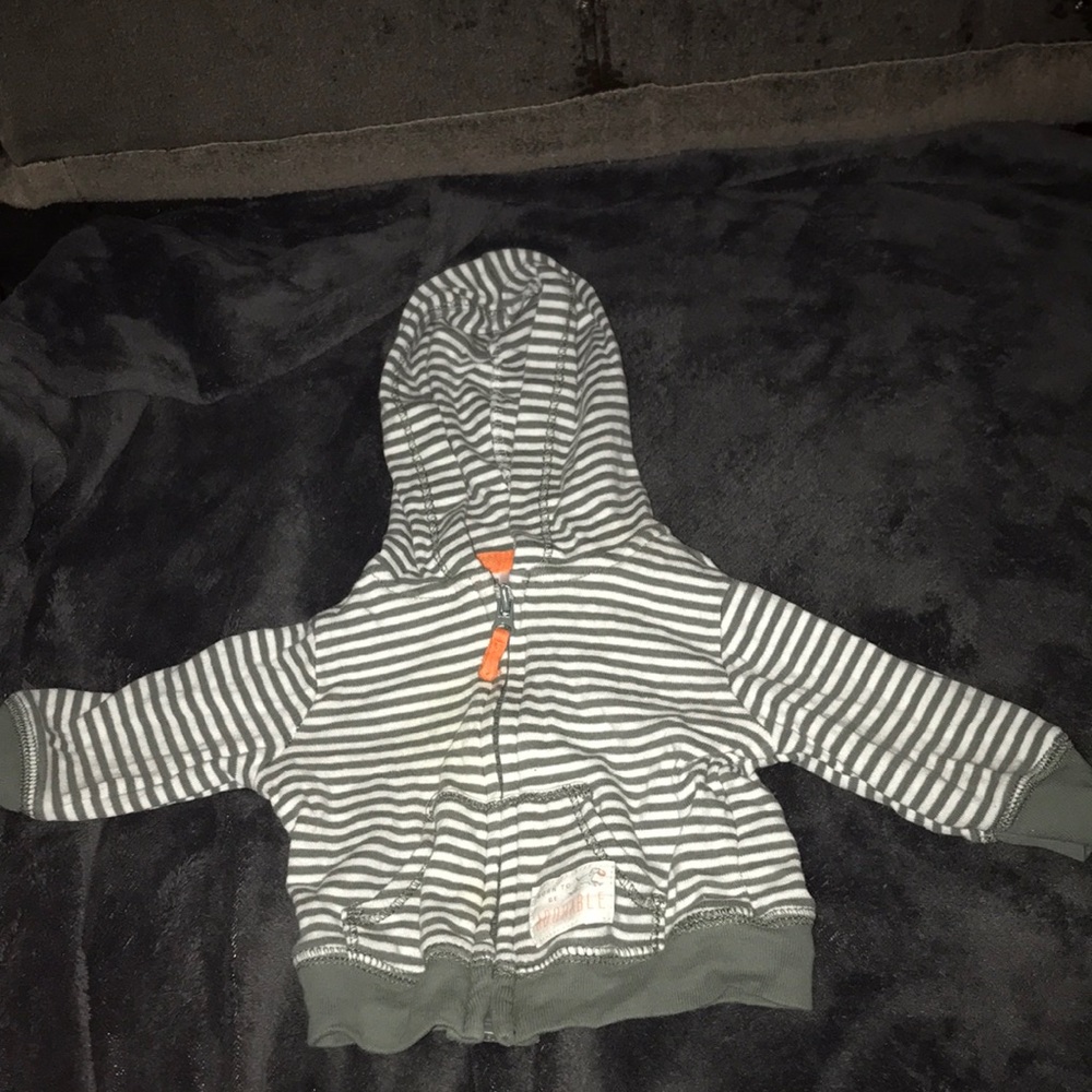 This is a Newborn green and white jacket just like new.